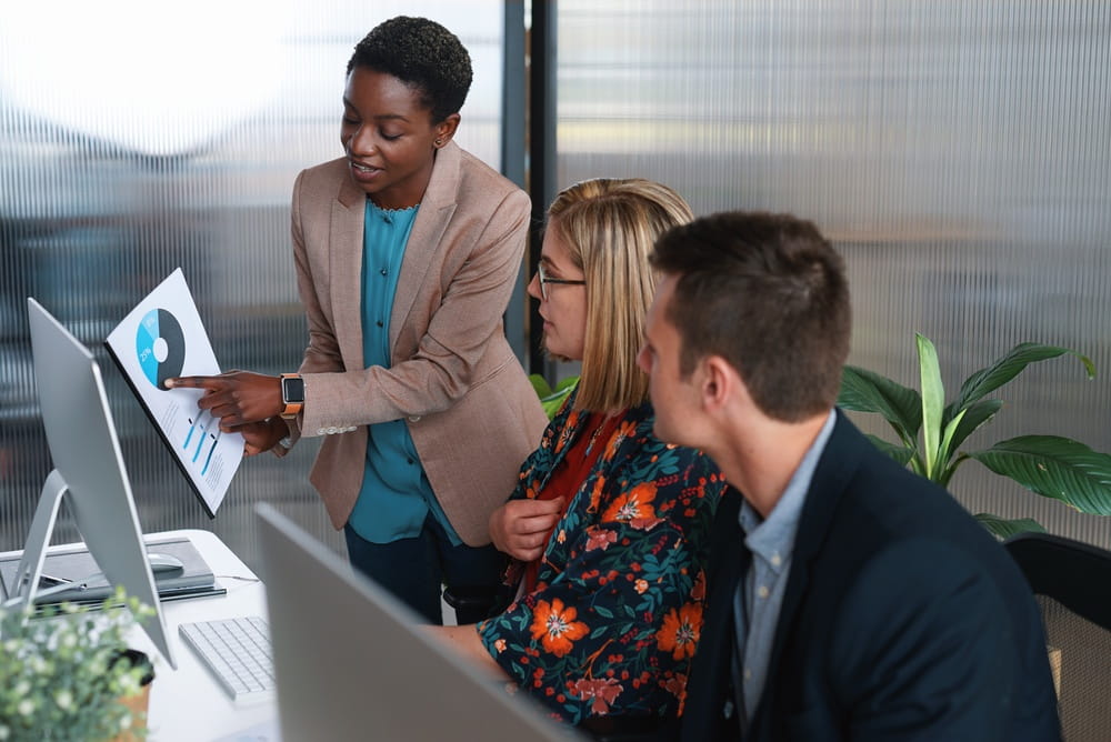 Team, advice and manager with documents in office for SEO graphs, track user behavior or insight.