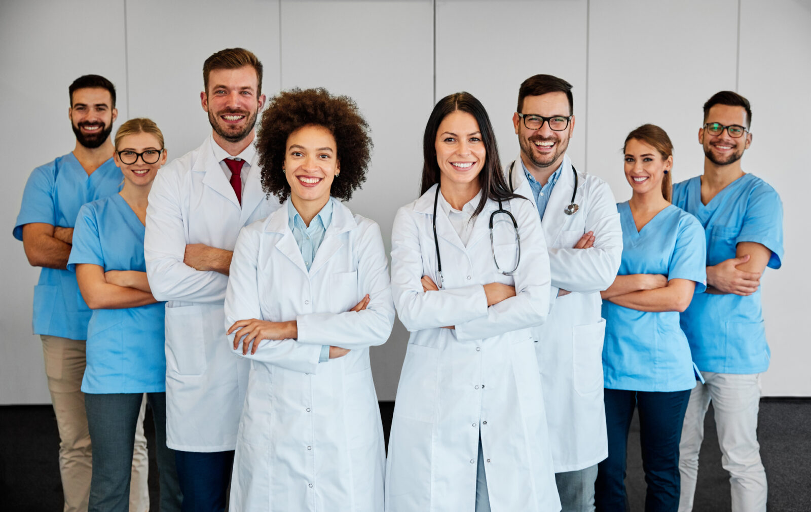 group of happy doctors and nurses