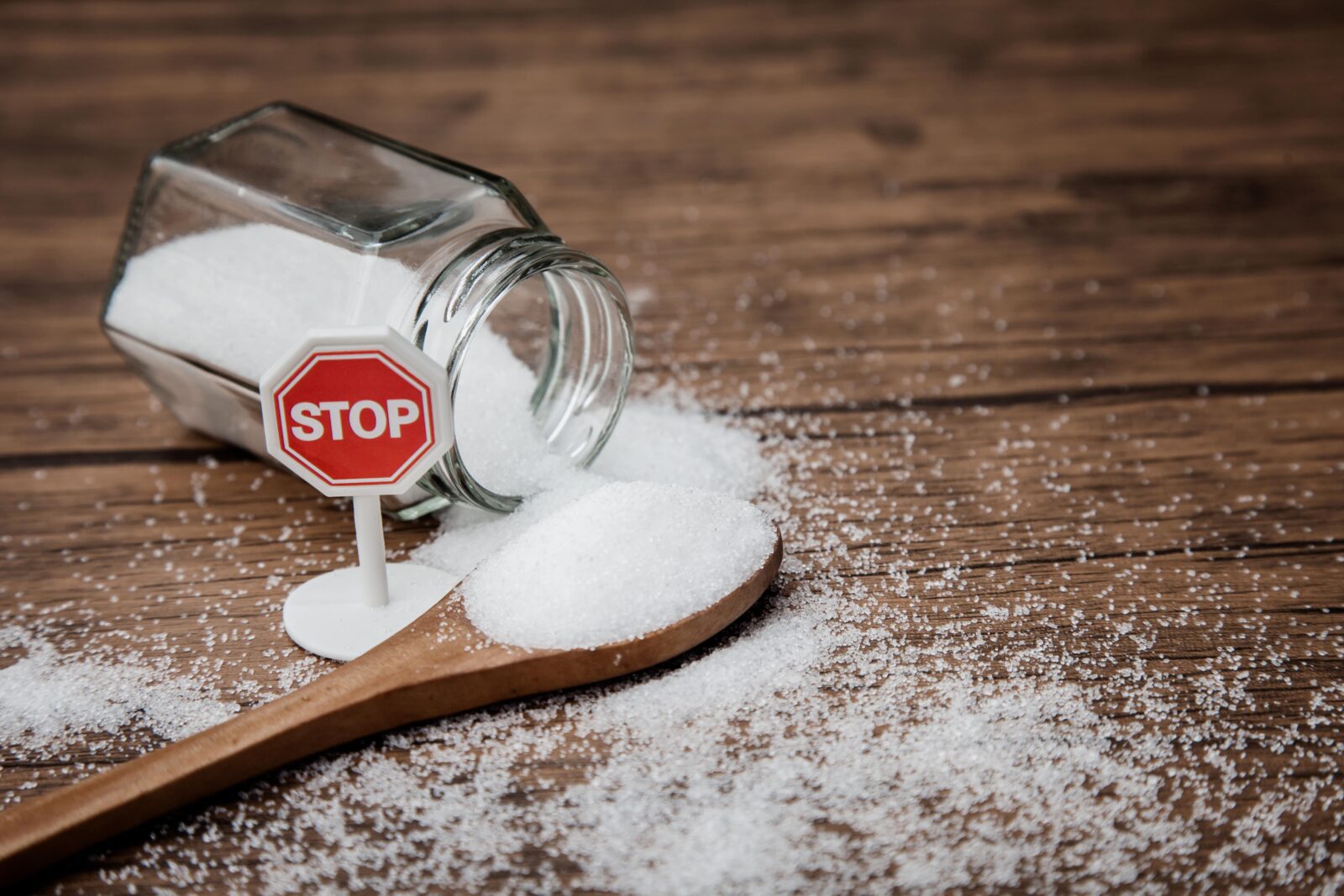 Stop sign on the sugar, warned that the sugar too much will make unhealthy nutrition, obesity, diabetes, dental care and much more.
