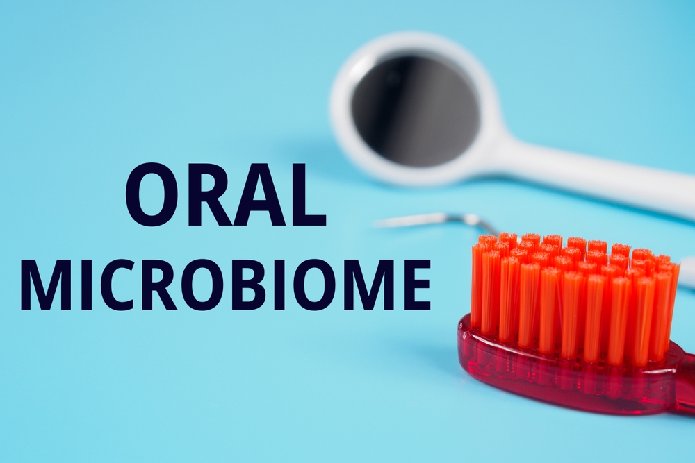 "Oral Microbiome" inscription title on simple dental background