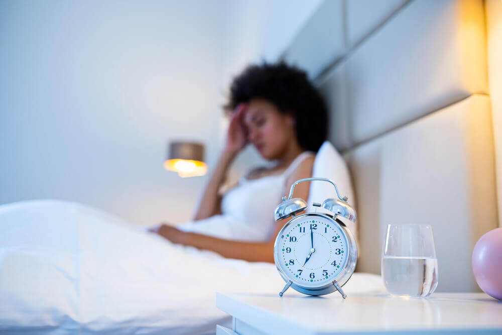 Woman having Sleeping Difficulties and Insomnia