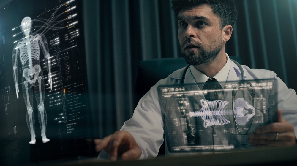 A doctor uses advanced holographic X-ray medical technologies to diagnose a patient's backbone, searching for symptoms like back pain