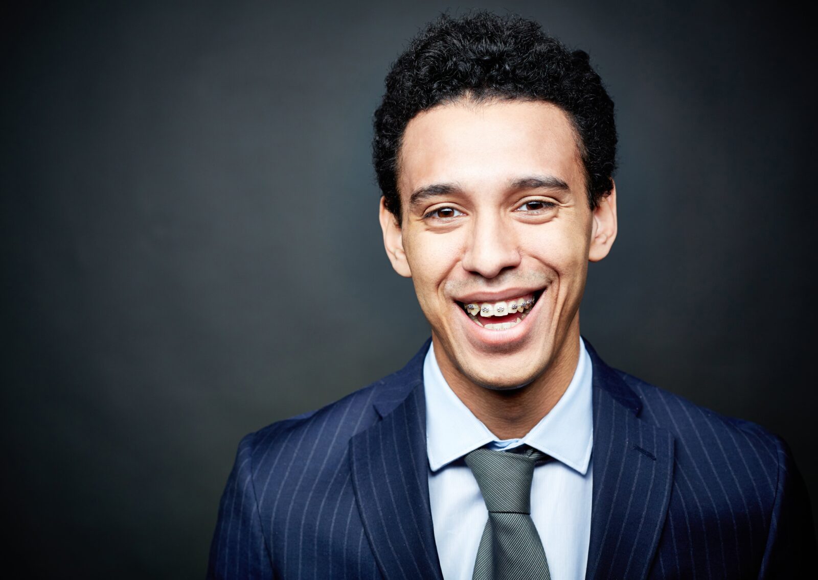 man in suit smiling