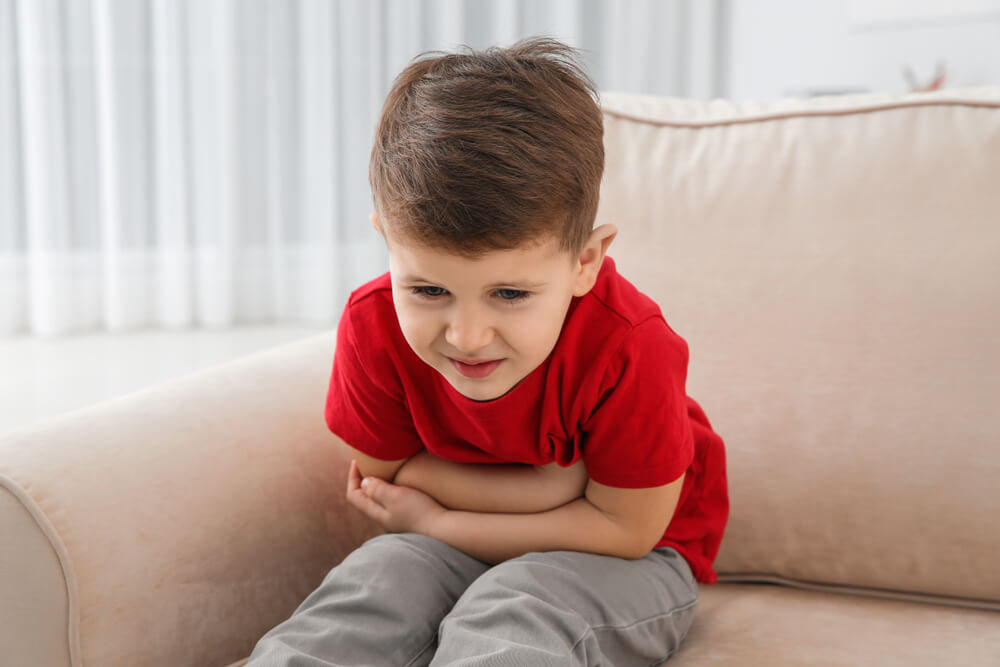 Little boy suffering from nausea