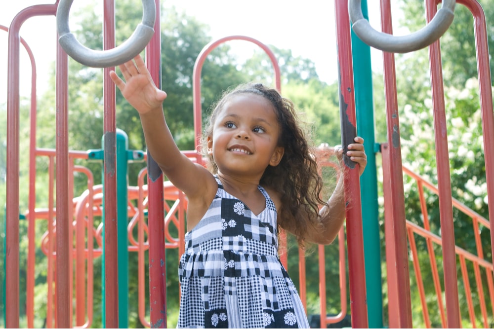 child enjoying the playground