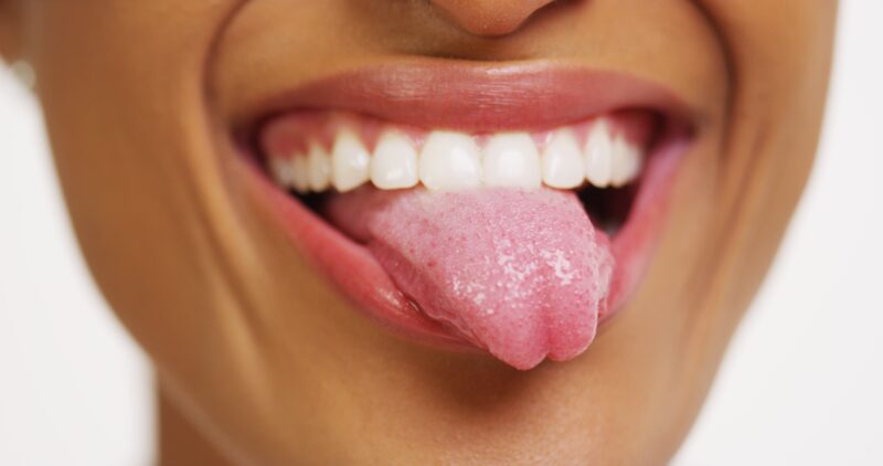 woman sticking out her tongue