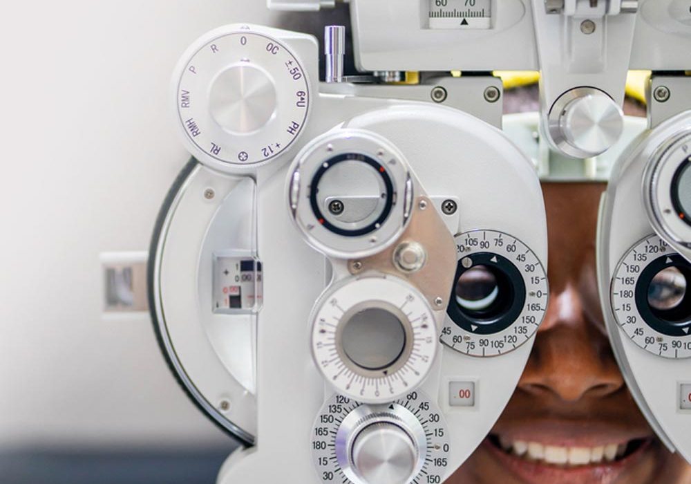 teen girl Doing Eye Test On Phoropter