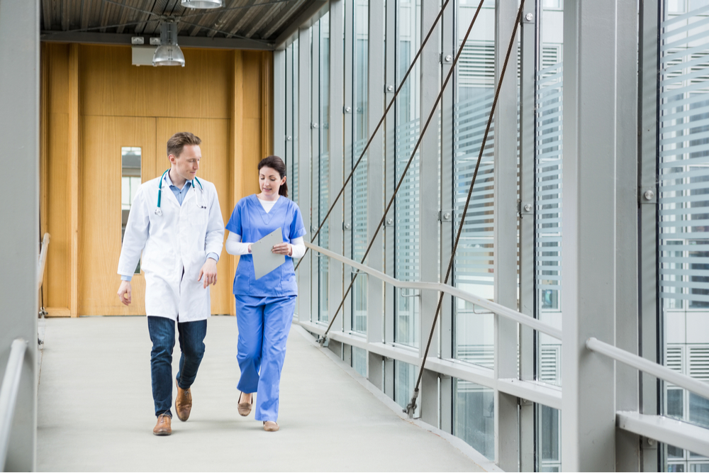 Medical team walking down hallway