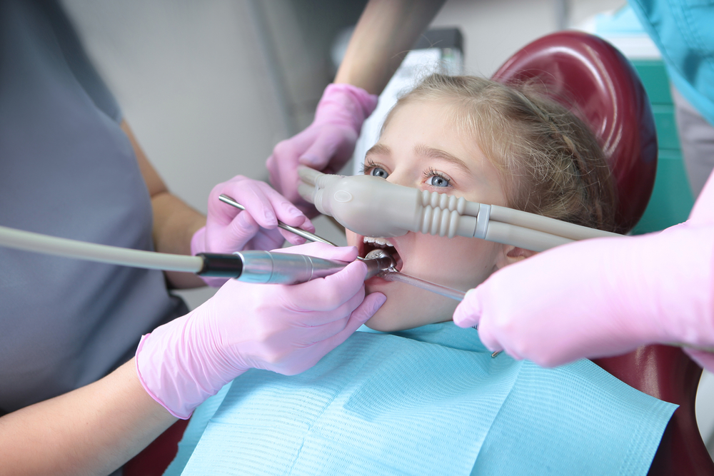 Dental treatment in a child with the use of nitrous oxide. Relaxation of the patient before surgical or dental procedures