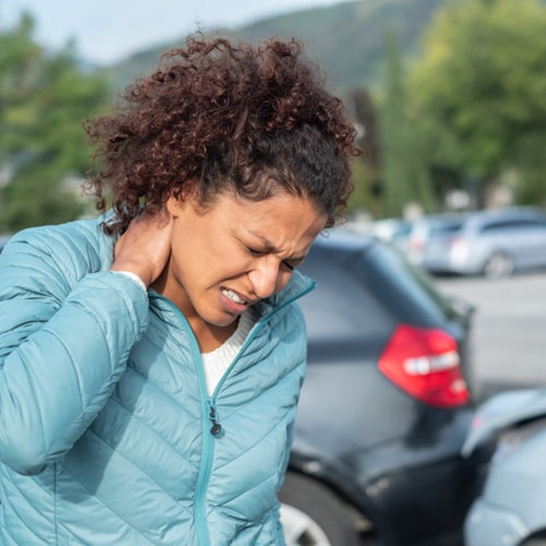 Painful whiplash after fender bender car crash