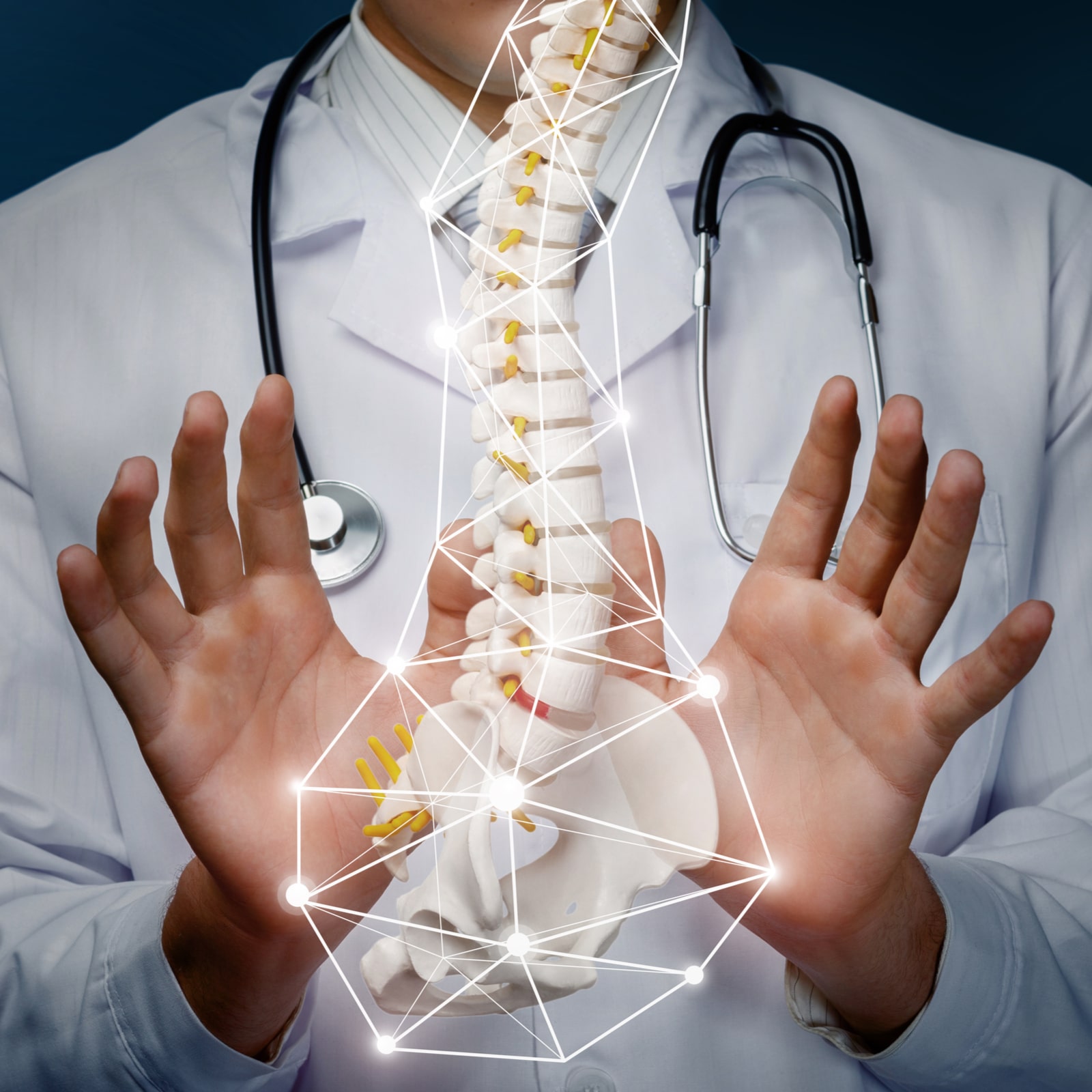 The concept of the treatment of the spine. The doctor produces manipulation with the spine on a blue background.