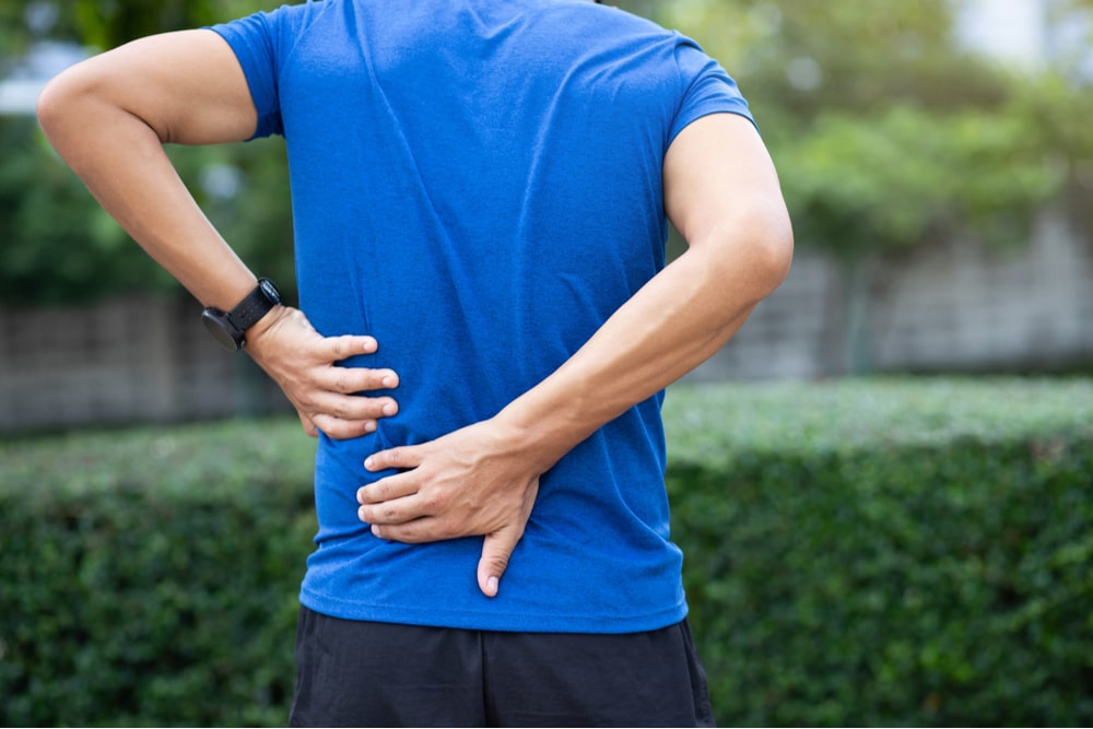 A man back pain after exercise concept