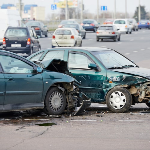 car crash accident on street, damaged automobiles after collision in city